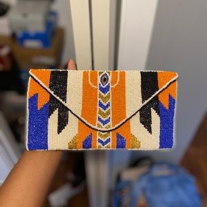 Hand beaded clutch
